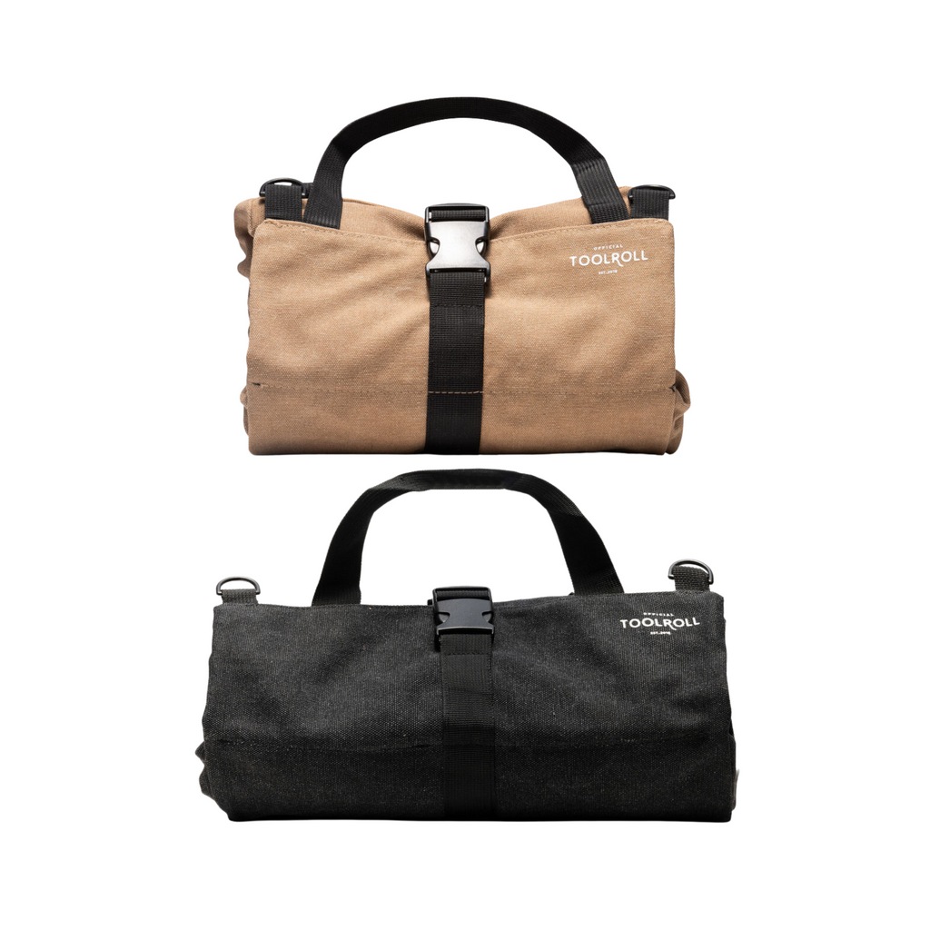 Voyager Black + Legacy Khaki Two rolled-up tool bags, one beige and one green, with the brand name 'TOOLROLL' visible on them. They are placed against a white background.